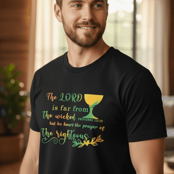Man wearing a black t-shirt with a colorful graphic design indoors