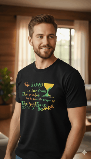 Man wearing a black t-shirt with a colorful graphic design indoors