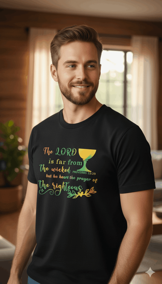 Man wearing a black t-shirt with a colorful graphic design indoors