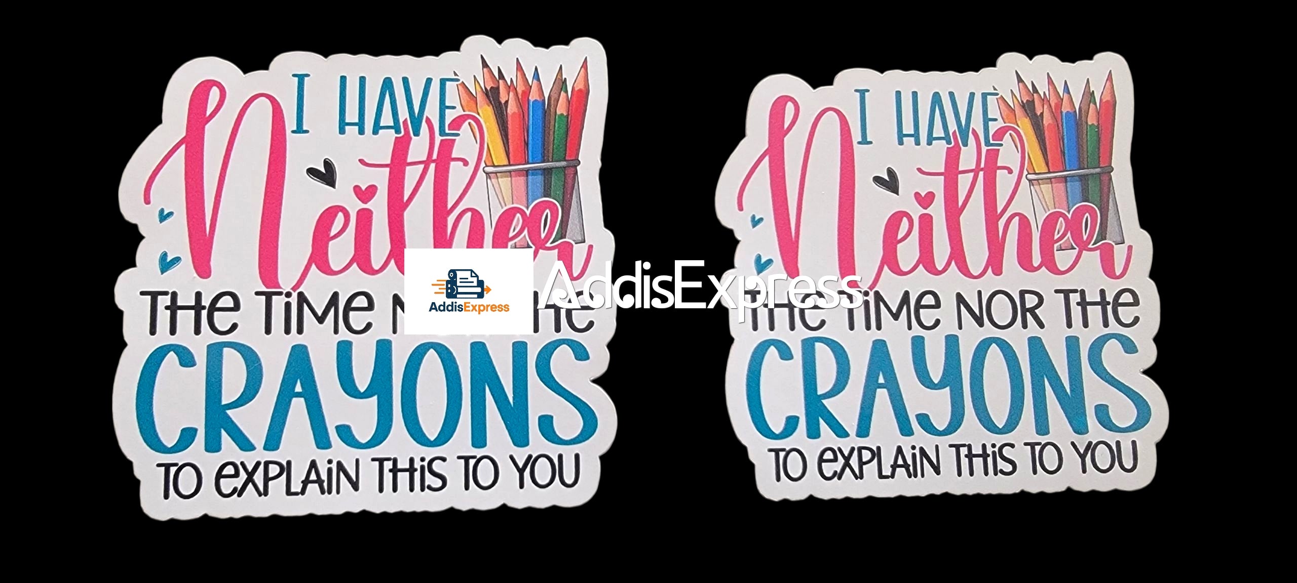 Two stickers with text and colorful crayon graphics on a black background
